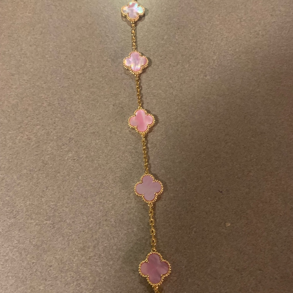 New, Never Used  Gold and White Clover Bracelet